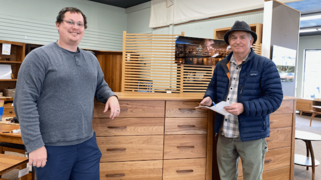 Woodcastle Furniture’s Korey Alexander (left) and founder Ron Loe (right side)